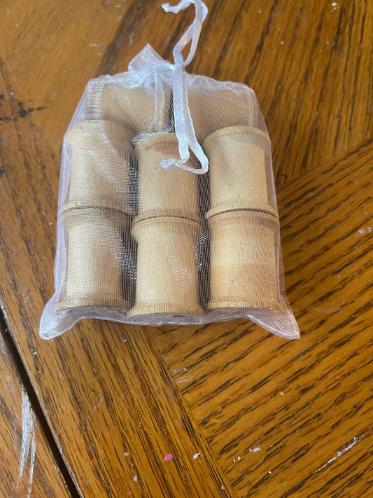 vintage wooden thread spools
